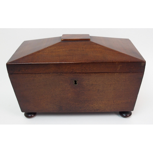 266 - A Victorian mahogany sarcophagus-shaped two division tea caddy