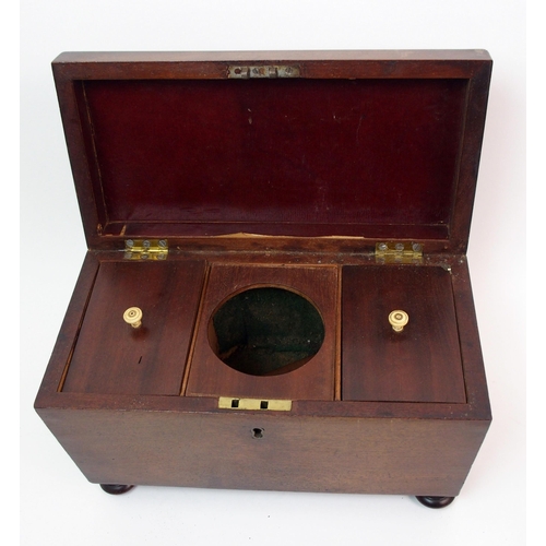 266 - A Victorian mahogany sarcophagus-shaped two division tea caddy