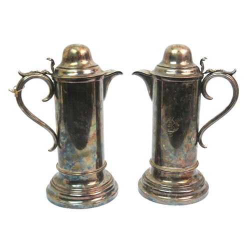 272 - A large pair of late Victorian EPNS wine flagons with domed hinged lids