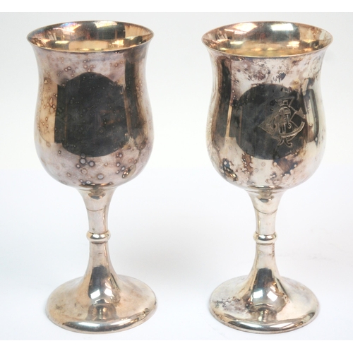 272 - A large pair of late Victorian EPNS wine flagons with domed hinged lids