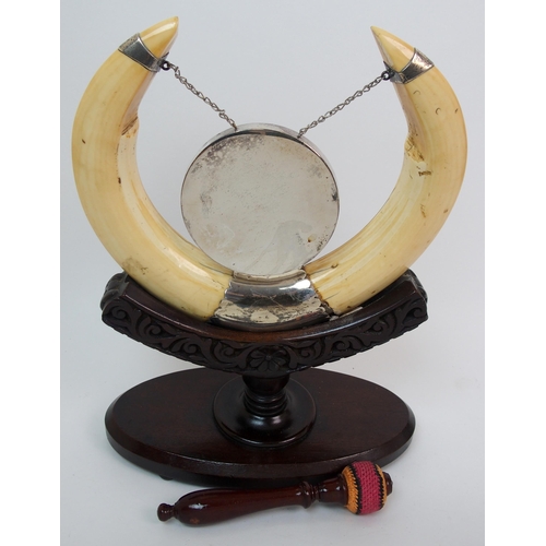 273 - An Edwardian warthog horn and silver-mounted gong stand