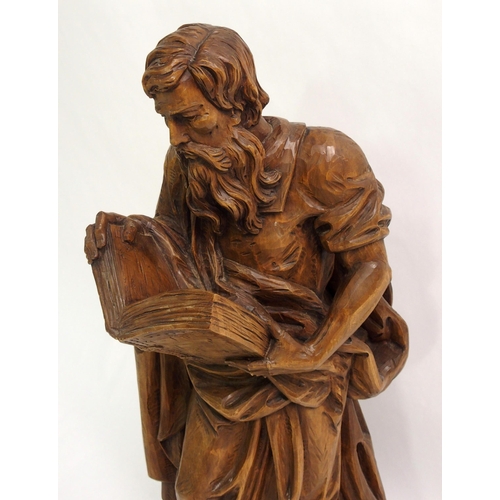 274 - An early 20th century carved wood figure of a biblical scholar