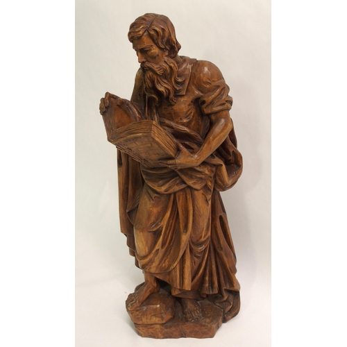 274 - An early 20th century carved wood figure of a biblical scholar