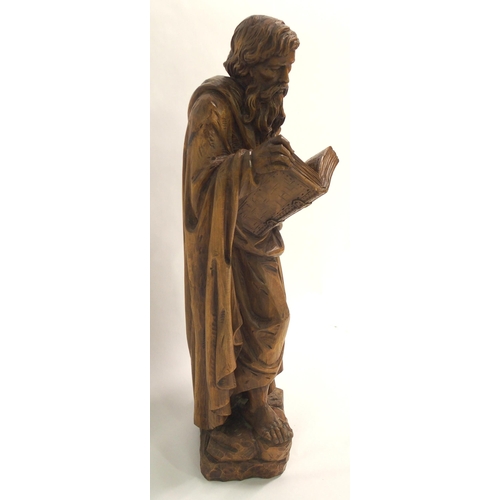 274 - An early 20th century carved wood figure of a biblical scholar