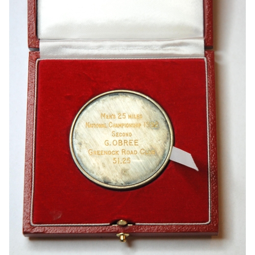 327 - A white-metal (silver) and enamel medal  the obverse inscribed The Road Time Trials Council