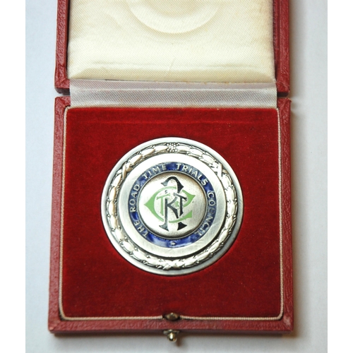 328 - A white-metal (silver) and enamel medal  the obverse inscribed The Road Time Trials Council