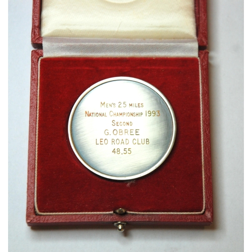 328 - A white-metal (silver) and enamel medal  the obverse inscribed The Road Time Trials Council