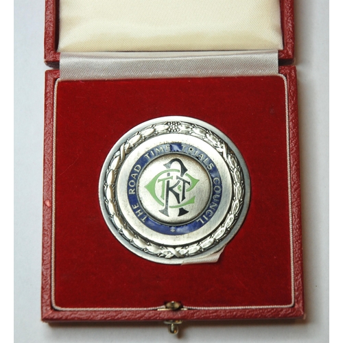 329 - A white-metal and enamel medal  the obverse inscribed The Road Time Trials Council