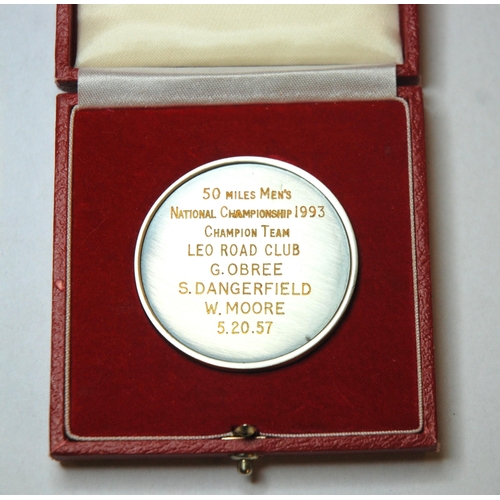 329 - A white-metal and enamel medal  the obverse inscribed The Road Time Trials Council