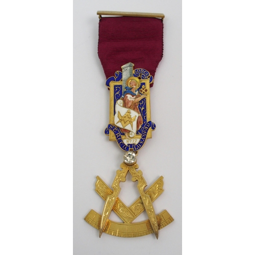 382 - A silver-gilt and enamel medal