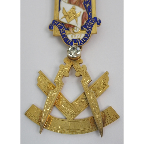 382 - A silver-gilt and enamel medal