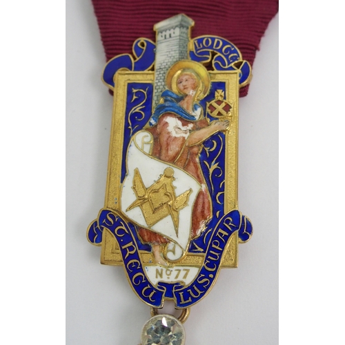 382 - A silver-gilt and enamel medal