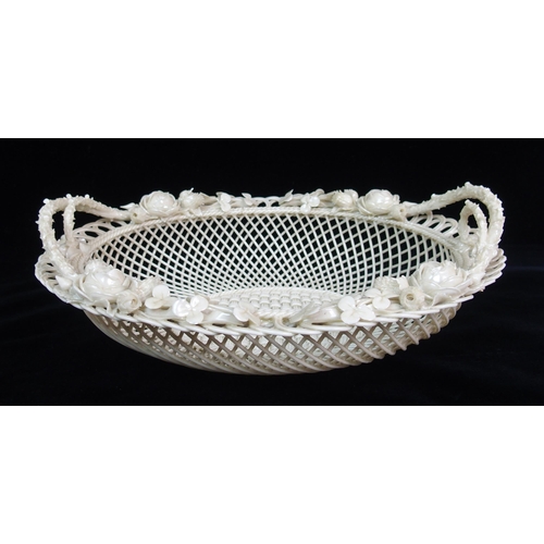 470 - A large Belleek First period 'Sydenham Twig' floral decorated oval basket