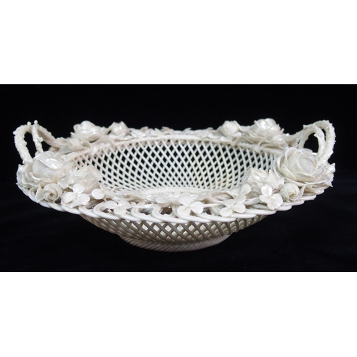 470 - A large Belleek First period 'Sydenham Twig' floral decorated oval basket