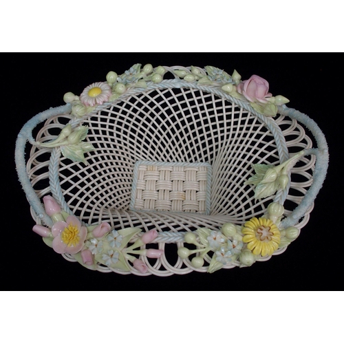 472 - A large Belleek Second Period floral decorated circular basket