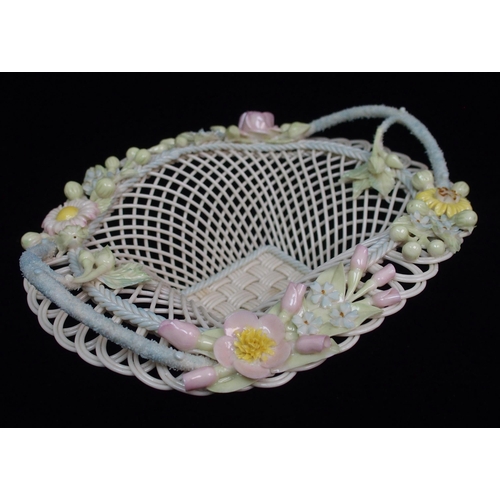 472 - A large Belleek Second Period floral decorated circular basket