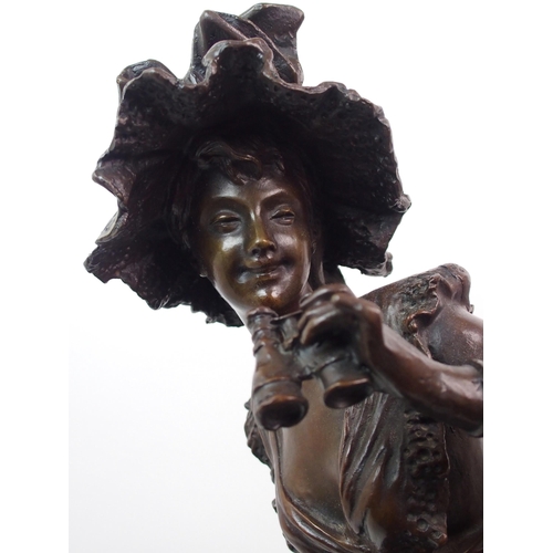 504 - After Louis Ernst Hottot (French  1834-1905) A bronze of a girl with binoculars