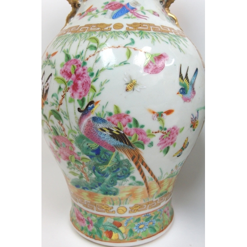 71 - A pair of Canton famille rose two handled vases