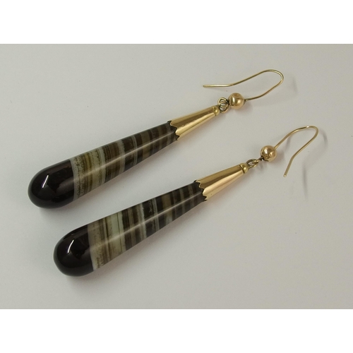 711 - A pair of banded agate earrings