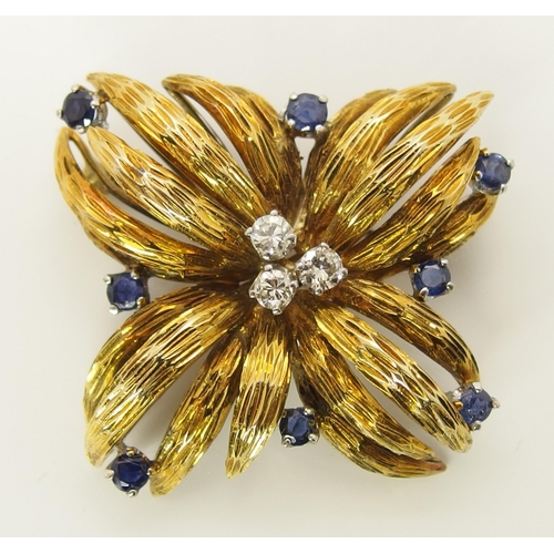 718 - A 14ct gold sapphire and diamond brooch