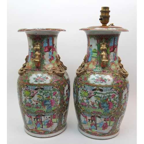 72 - A pair of Canton famille rose vases