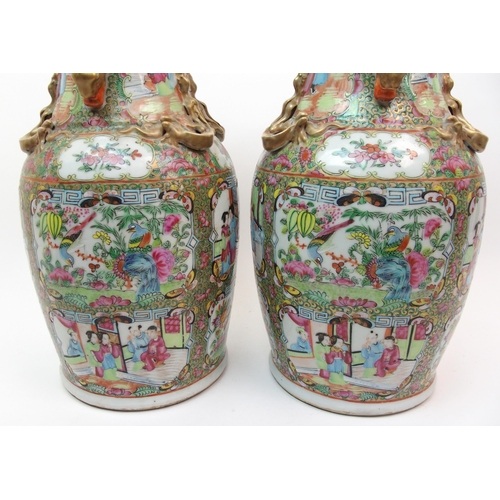 72 - A pair of Canton famille rose vases