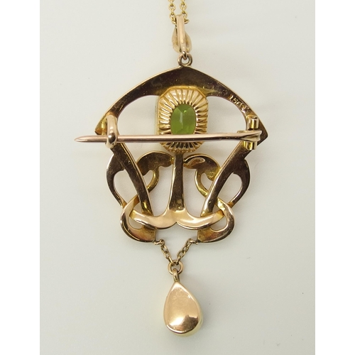 725 - A 15ct rose gold Art Nouveau pendant set with a peridot and a blister pearl