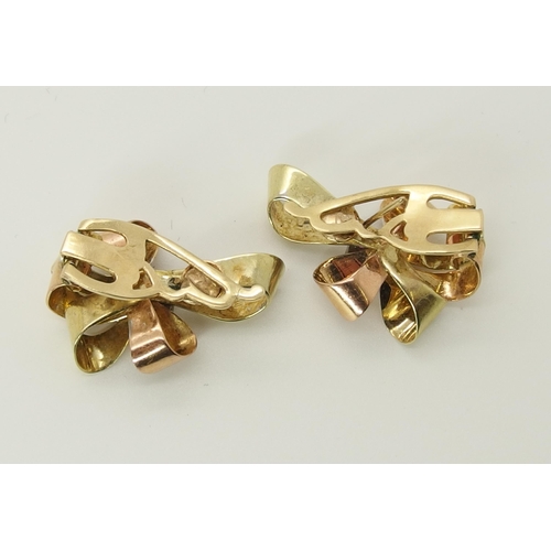 726 - A pair of 14ct gold ruby and diamond ear clips