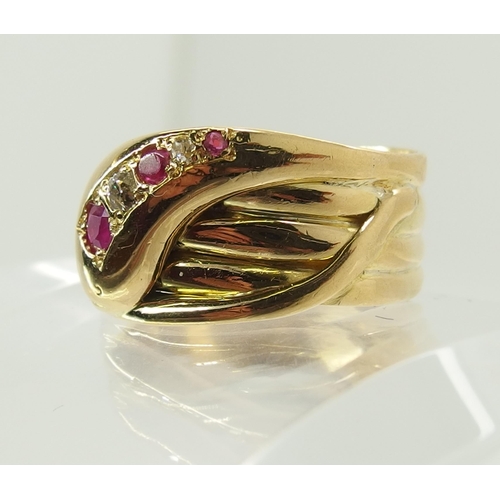 729 - An 18ct gold ruby and diamond set snake ring