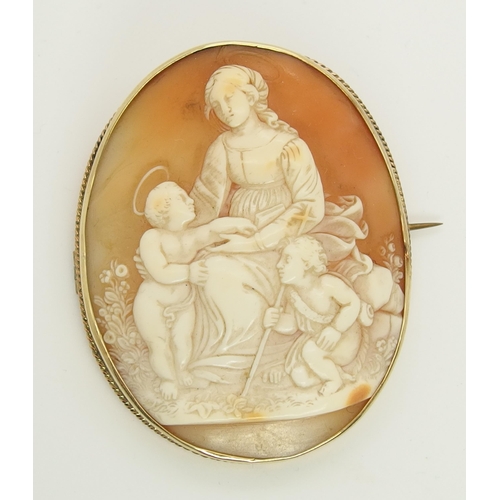 730 - A large shell cameo in a 9ct brooch mount