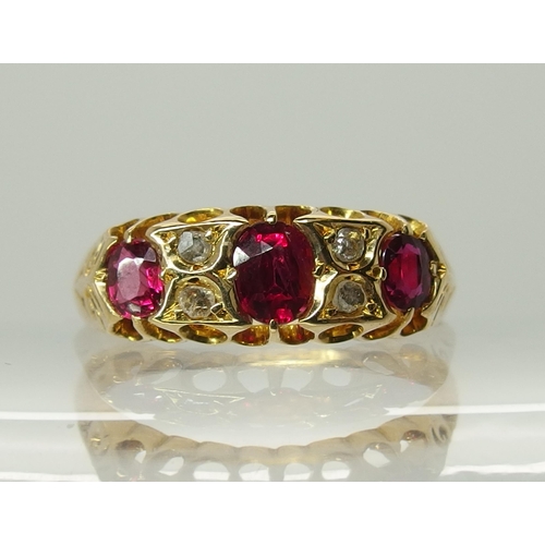 737 - An 18ct gold ruby and rose cut diamond ring