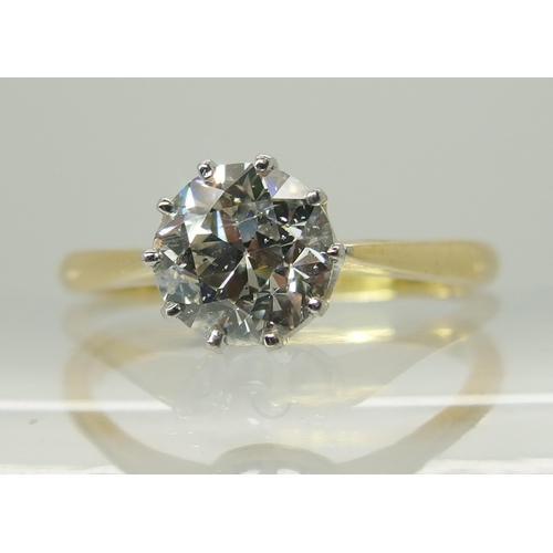 738 - An 18ct yellow and white gold diamond solitaire