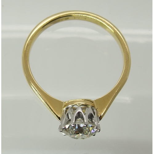 738 - An 18ct yellow and white gold diamond solitaire