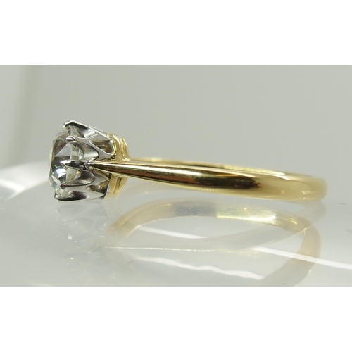 738 - An 18ct yellow and white gold diamond solitaire