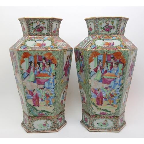 74 - A pair of Canton hexagonal famille rose vases