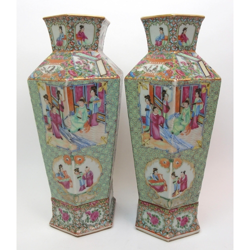 74 - A pair of Canton hexagonal famille rose vases