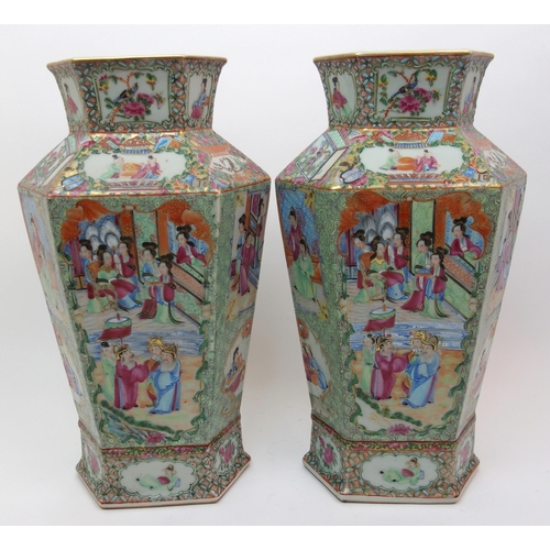 74 - A pair of Canton hexagonal famille rose vases