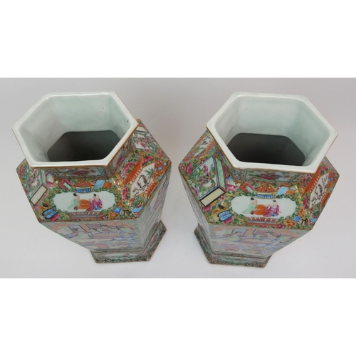 74 - A pair of Canton hexagonal famille rose vases