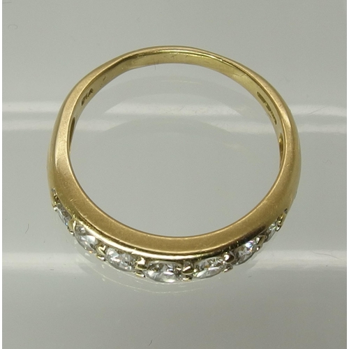 750 - An 18ct yellow gold seven stone diamond ring