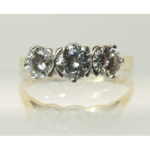 759 - An 18ct three stone diamond ring