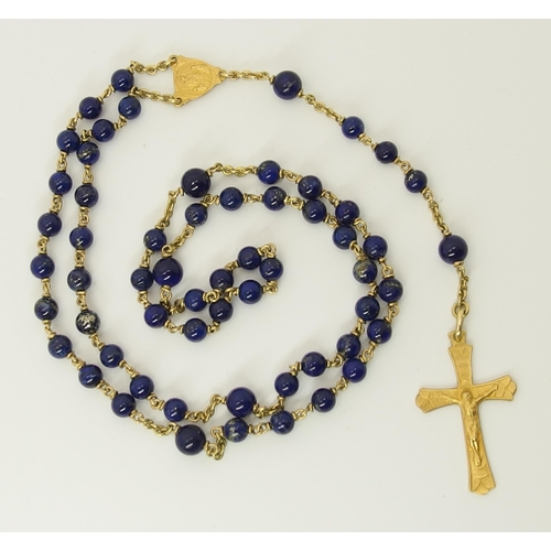 761 - An 18ct yellow gold and lapis lazuli rosary