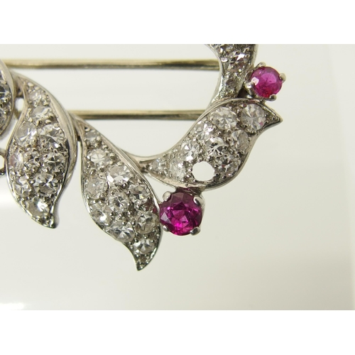 762 - A diamond and ruby brooch