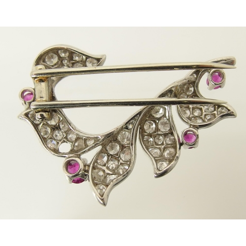 762 - A diamond and ruby brooch