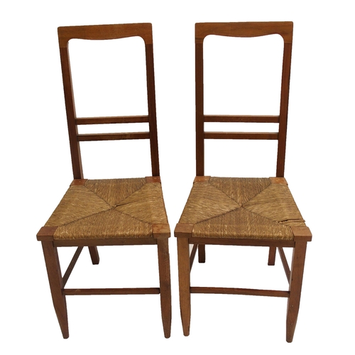 807 - A pair of Arts and Crafts chairs