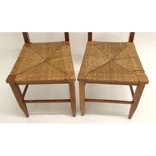 807 - A pair of Arts and Crafts chairs