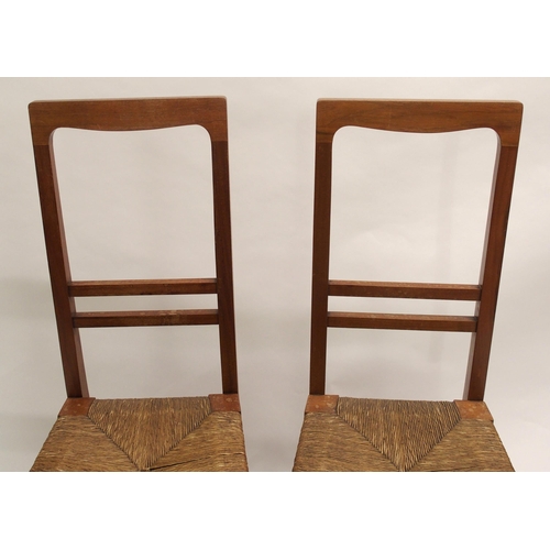 807 - A pair of Arts and Crafts chairs