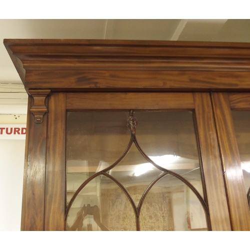 818 - A Victorian mahogany two door bookcase