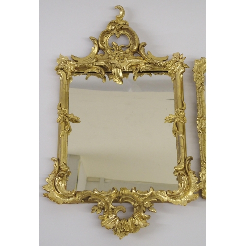 820 - A 19th Century giltwood and gesso rococo style wall mirror