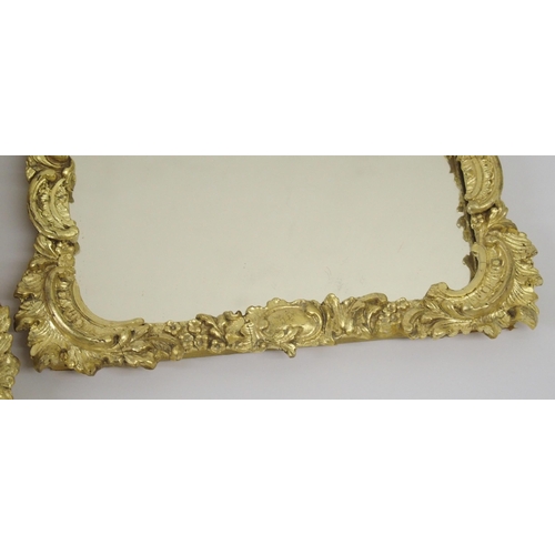 820 - A 19th Century giltwood and gesso rococo style wall mirror