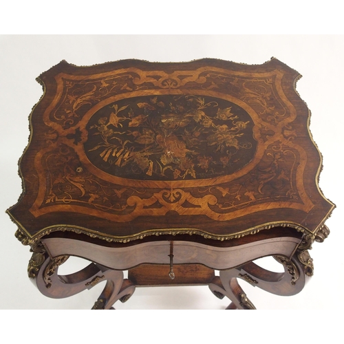 824 - A Louis XV style gilt metal-mounted rosewood and inlaid sewing table